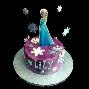 Gâteau Elsa reine des neiges violet et flocons de neige