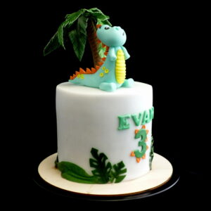 Gâteau petit dinosaure et palmier